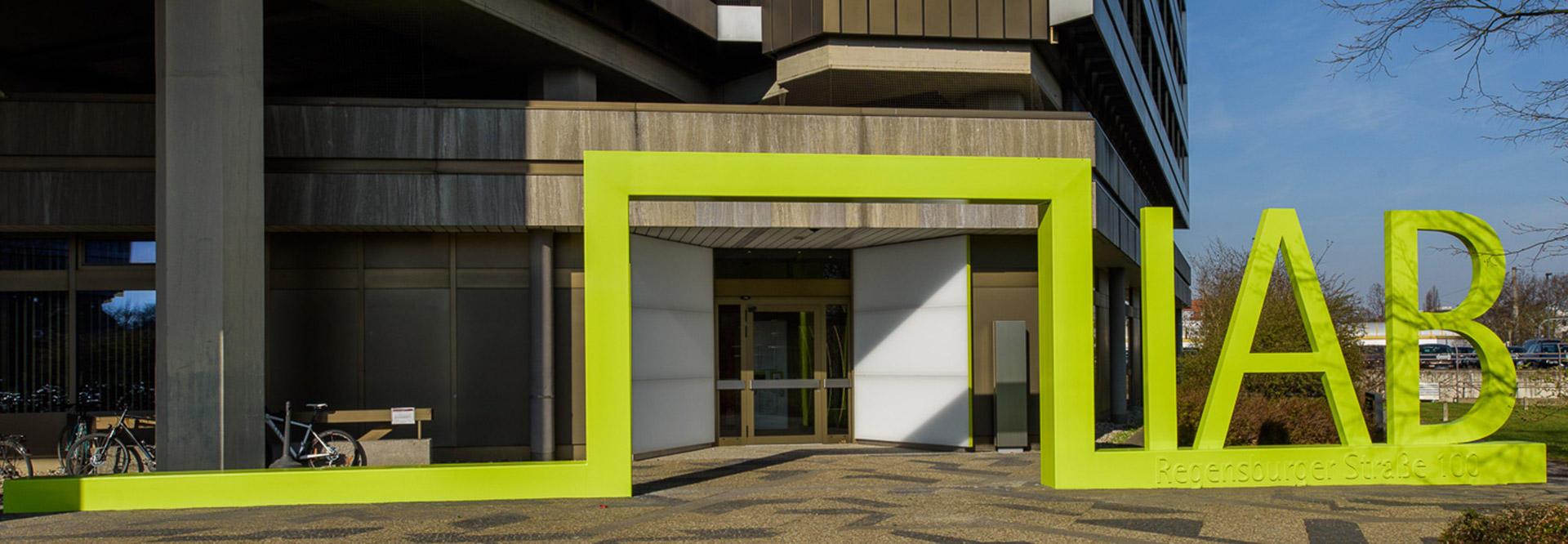 IAB entrance portal with the green capital letters IAB.
