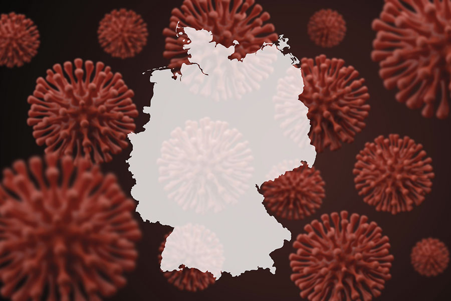 Map of Germany surrounded by viruses.