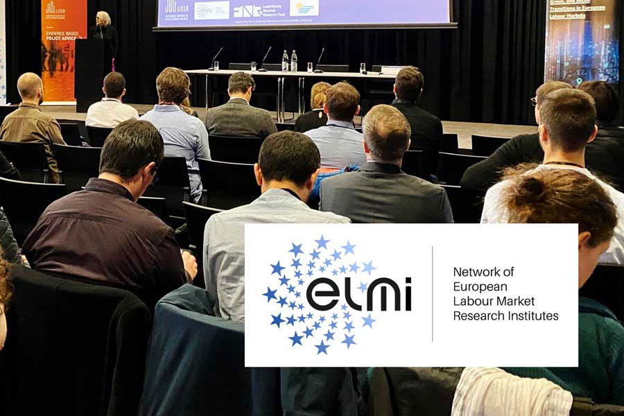 Listeners and podium at the ELMI conference